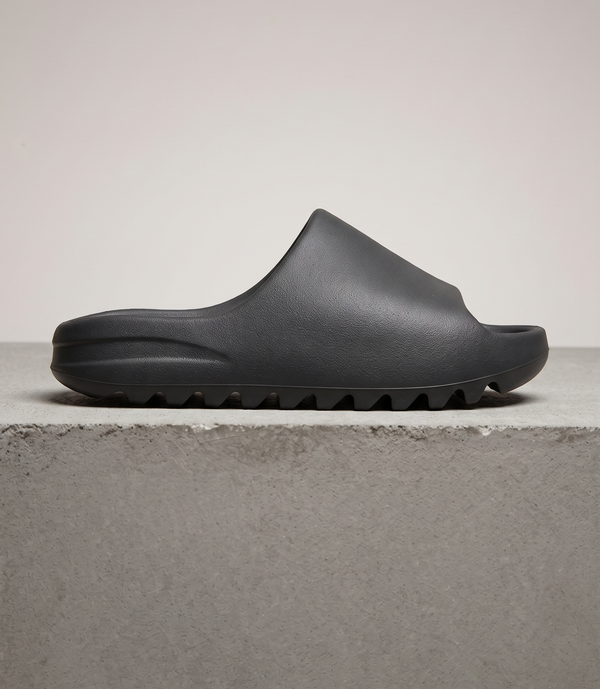 adidas Yeezy Slide Onyx, side profile studio photograph