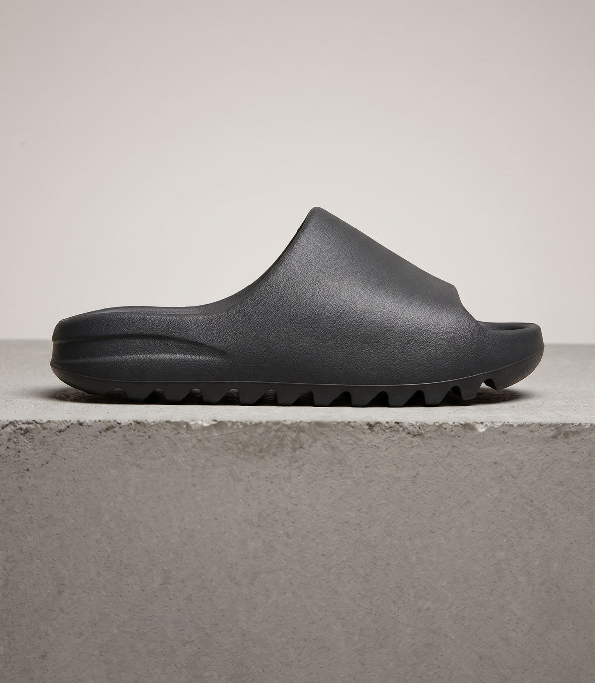 adidas Yeezy Slide Onyx, side profile studio photograph