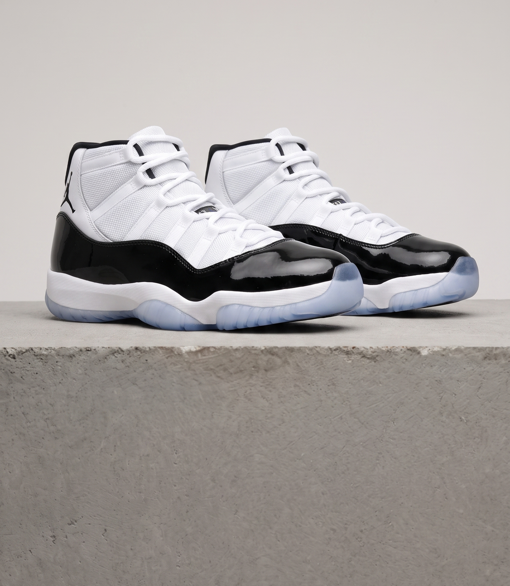 Air Jordan 11 Retro Concord, three-quarter front view of the pair