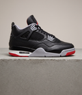 Air Jordan 4 Retro Bred Reimagined, side profile studio photograph