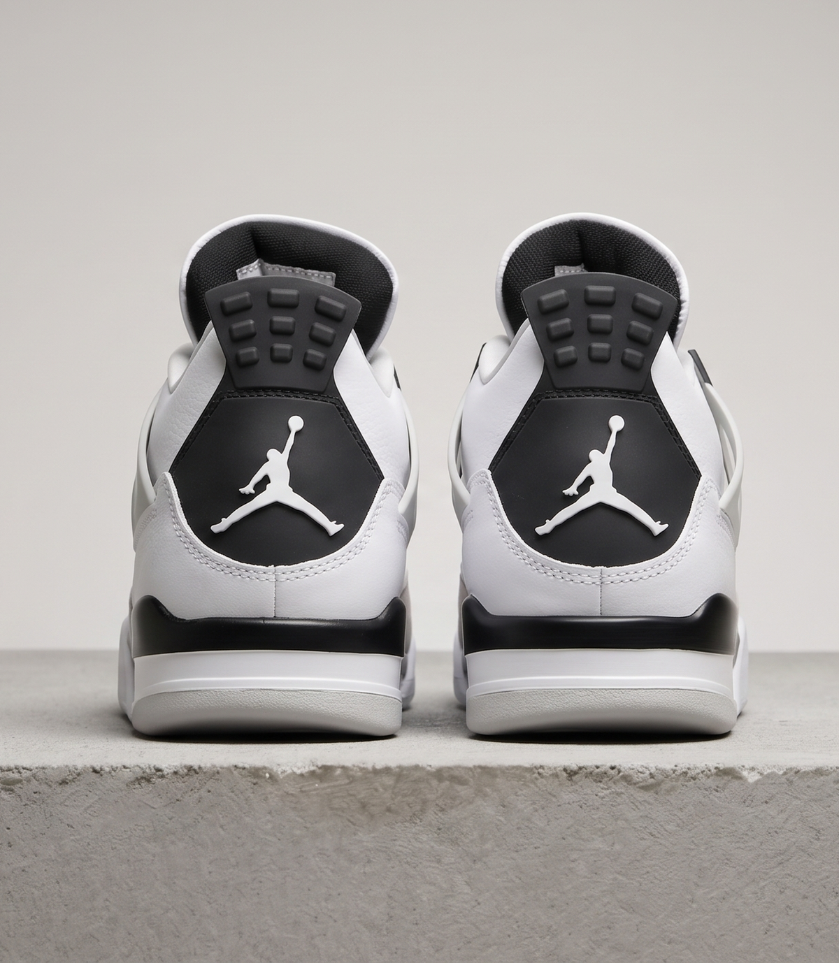 Air Jordan 4 Retro Military Black, heel view with Jumpman panels