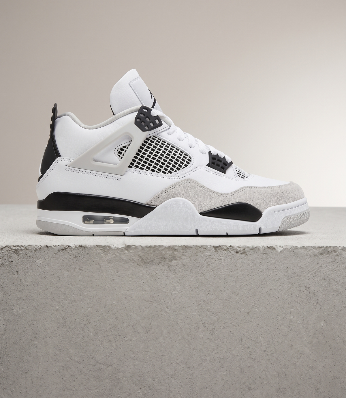 Air Jordan 4 Retro Military Black, side profile studio photograph