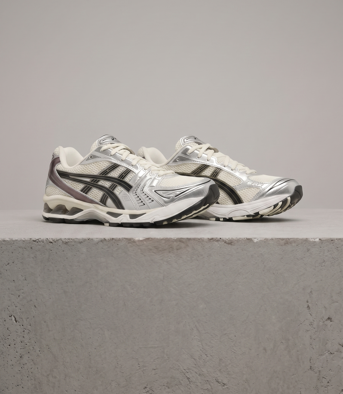 ASICS GEL-Kayano 14, three-quarter front view of the pair
