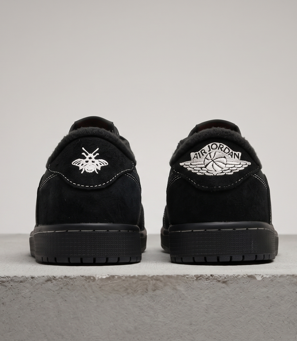 Travis Scott x Air Jordan 1 Low Black Phantom, heel view with bee and wings logos