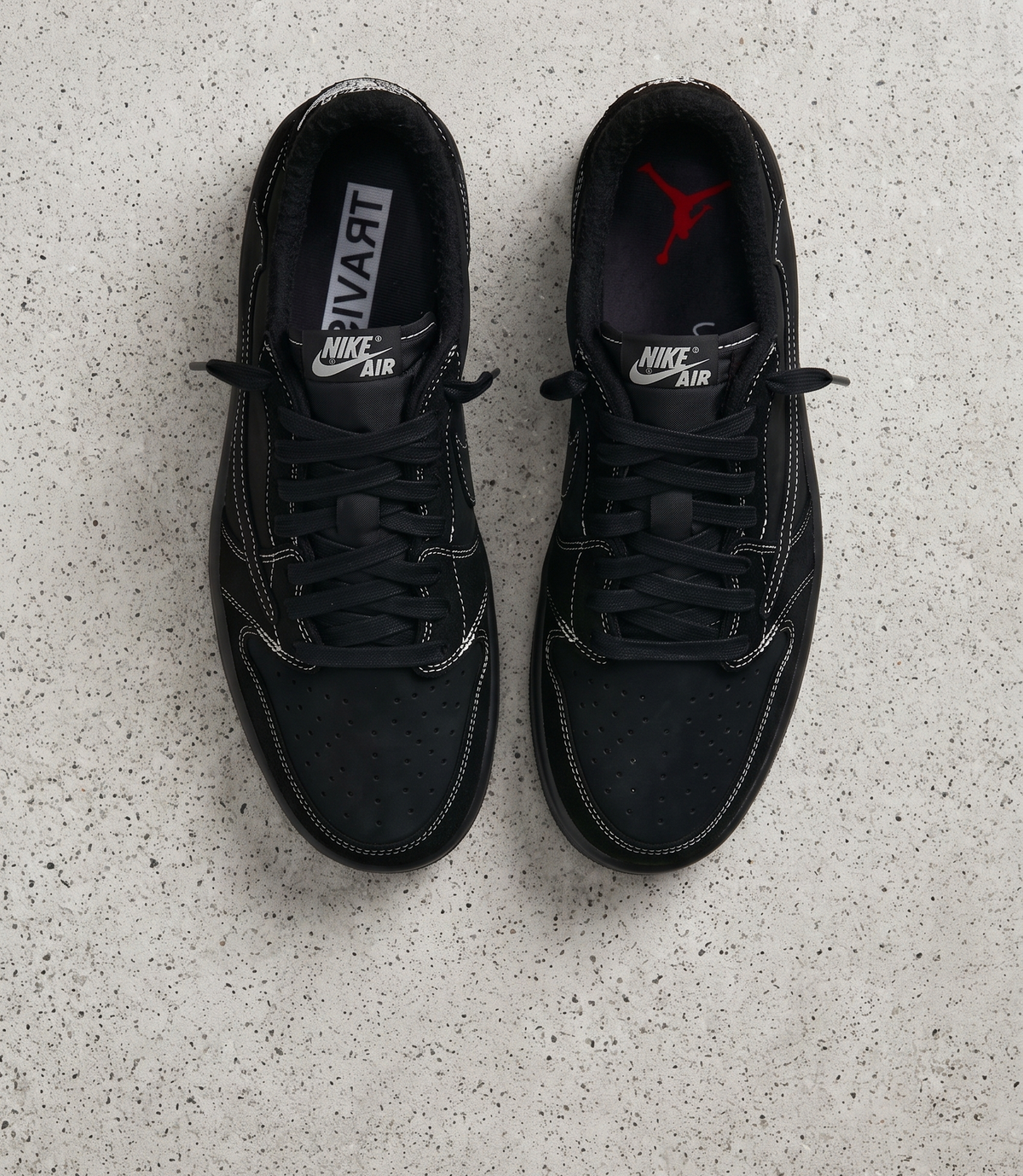 Travis Scott x Air Jordan 1 Low Black Phantom, top-down view of the pair