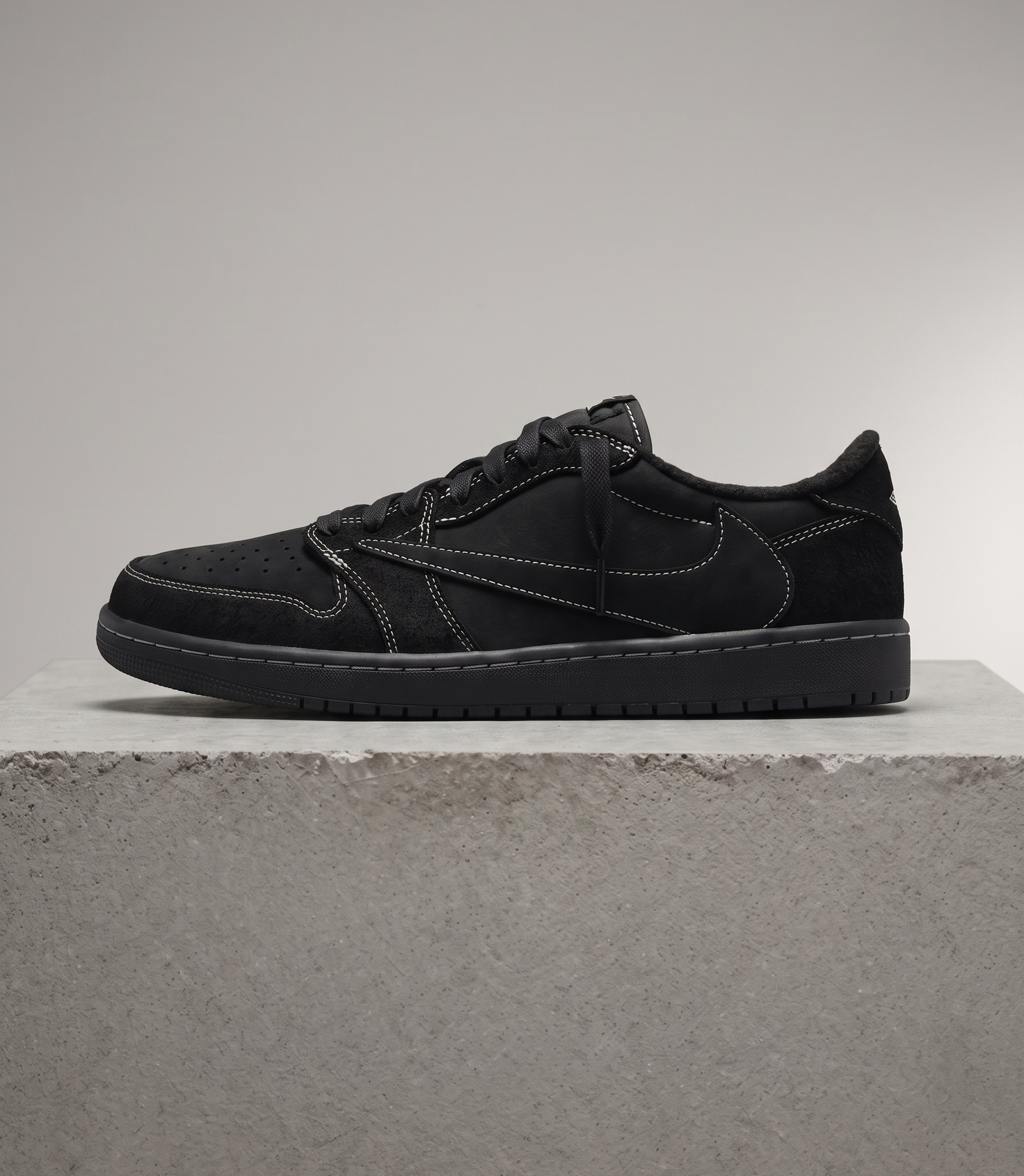 Travis Scott x Air Jordan 1 Low OG Black Warrior, side profile studio photograph